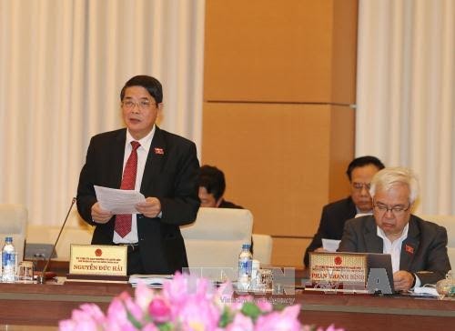 Revised Law on Public Debt Management debated - ảnh 1